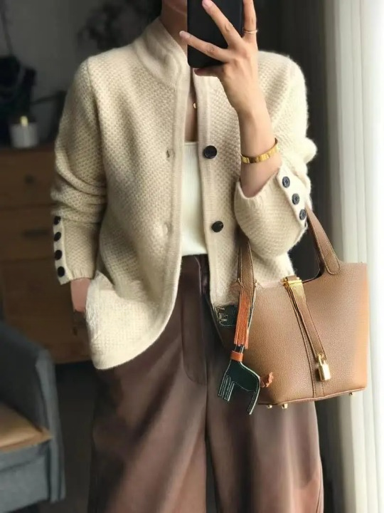 Women's textured knit jacket with stand collar, buttons and patch pockets