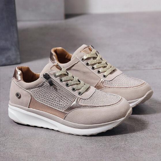 Women's lace-up trainers with textured panels, side zip and white sole