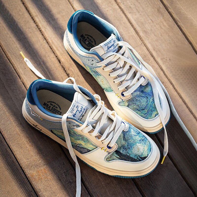 Unisex lace-up sneakers with multicoloured landscape artwork and blue soles
