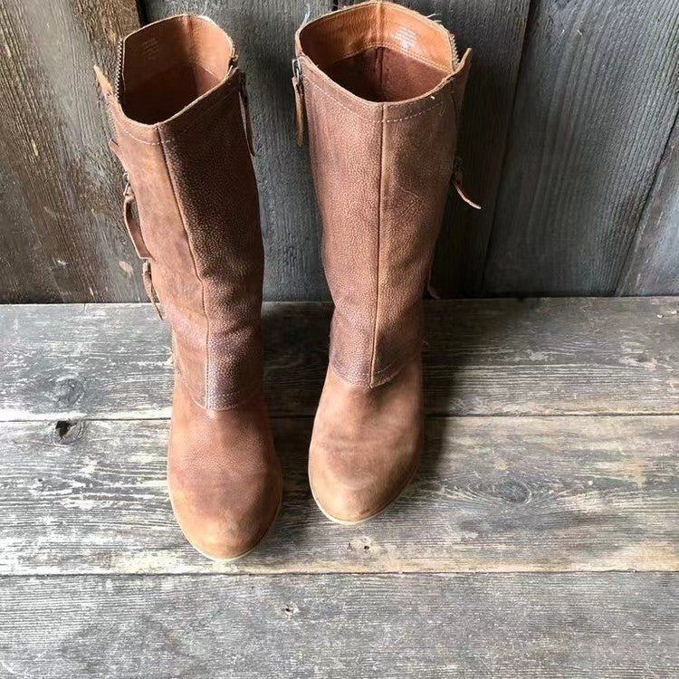 Women's brown tall boots with side zips, stitched panels and low heels