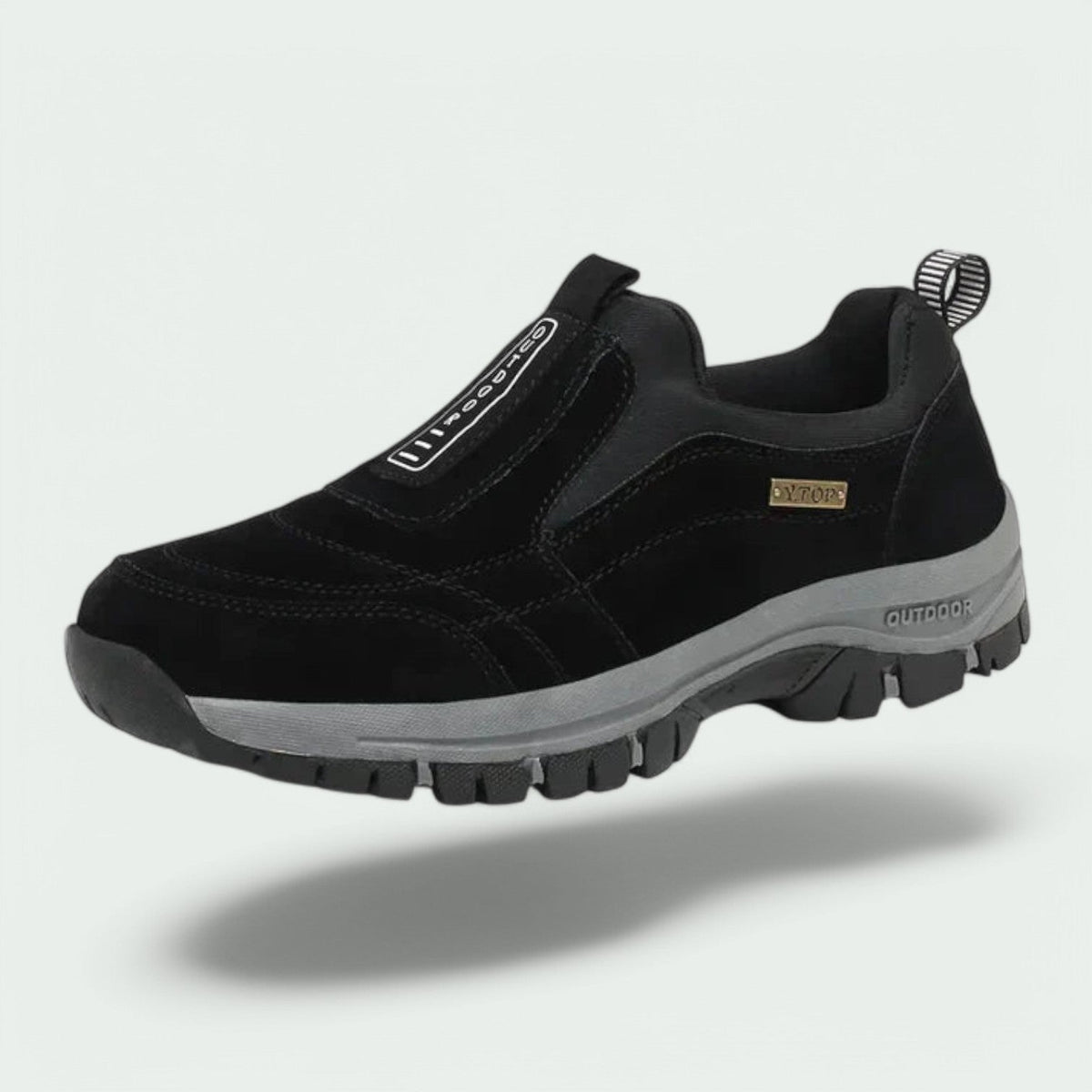 Slip-on walking shoe with stitched panels, contrast sole and deep tread