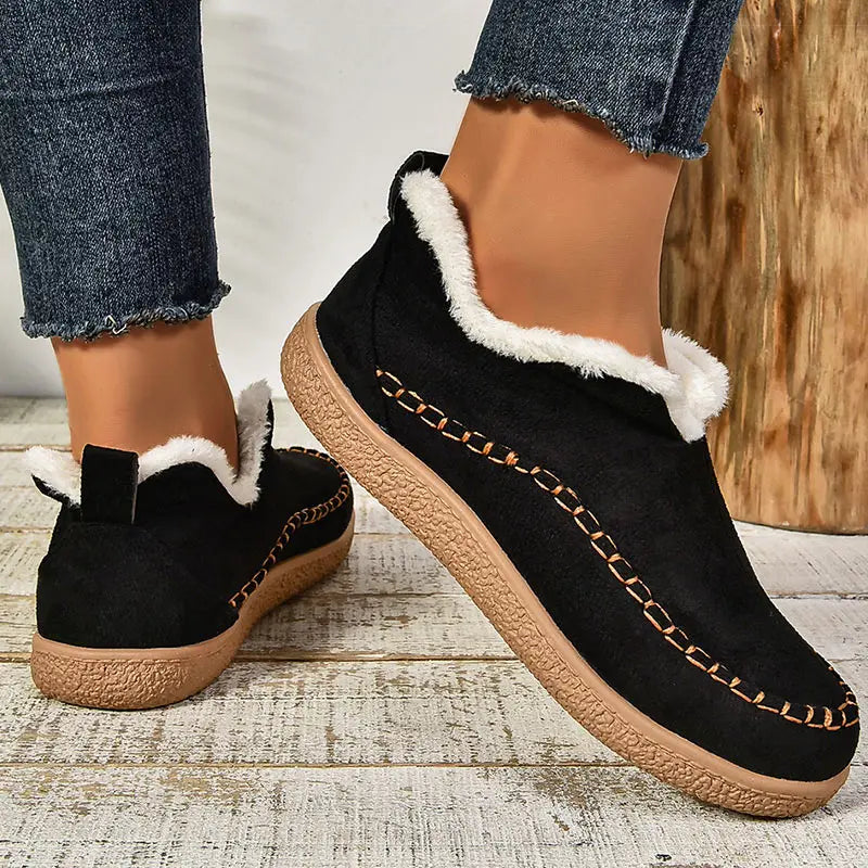 Women's fur-lined slip-on loafers with round toes and flat textured soles