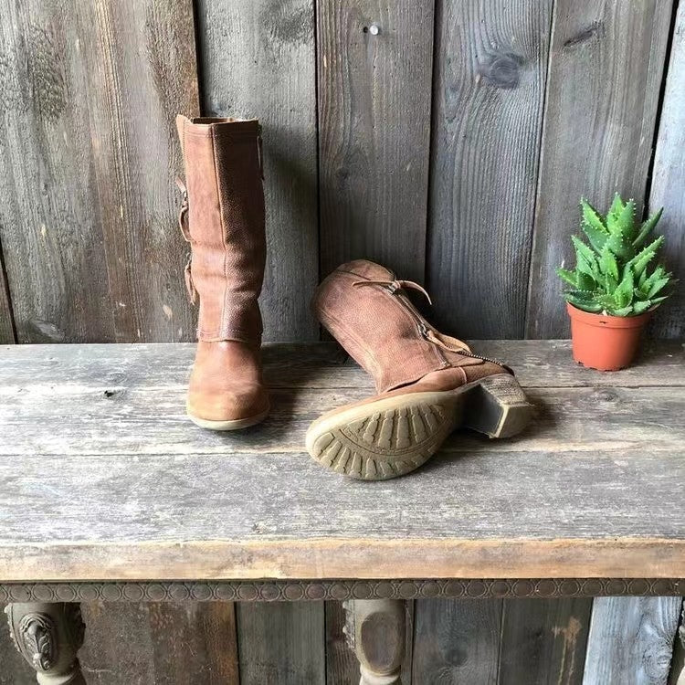 Women's brown tall boots with side zips, stitched panels and low heels