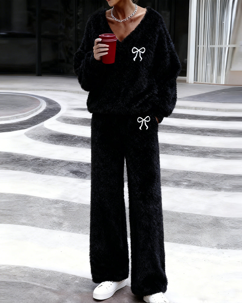 Women's textured two-piece set with bow embroidery, V-neck top and wide-leg trousers