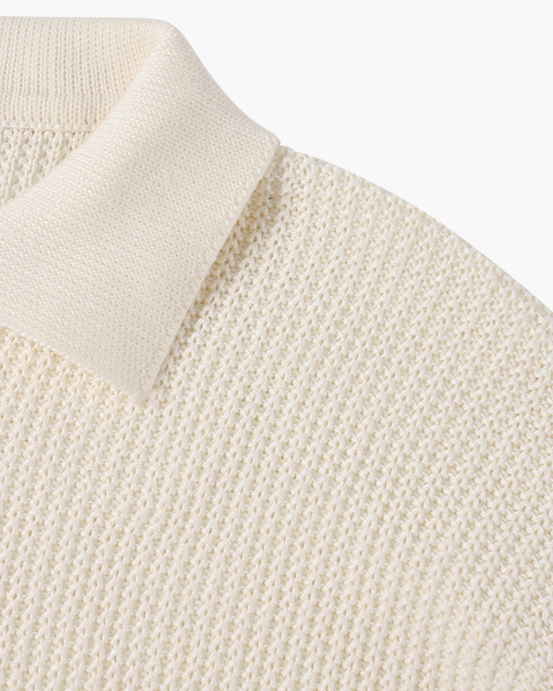 Men's textured collared sweater with half-zip fastening and long sleeves