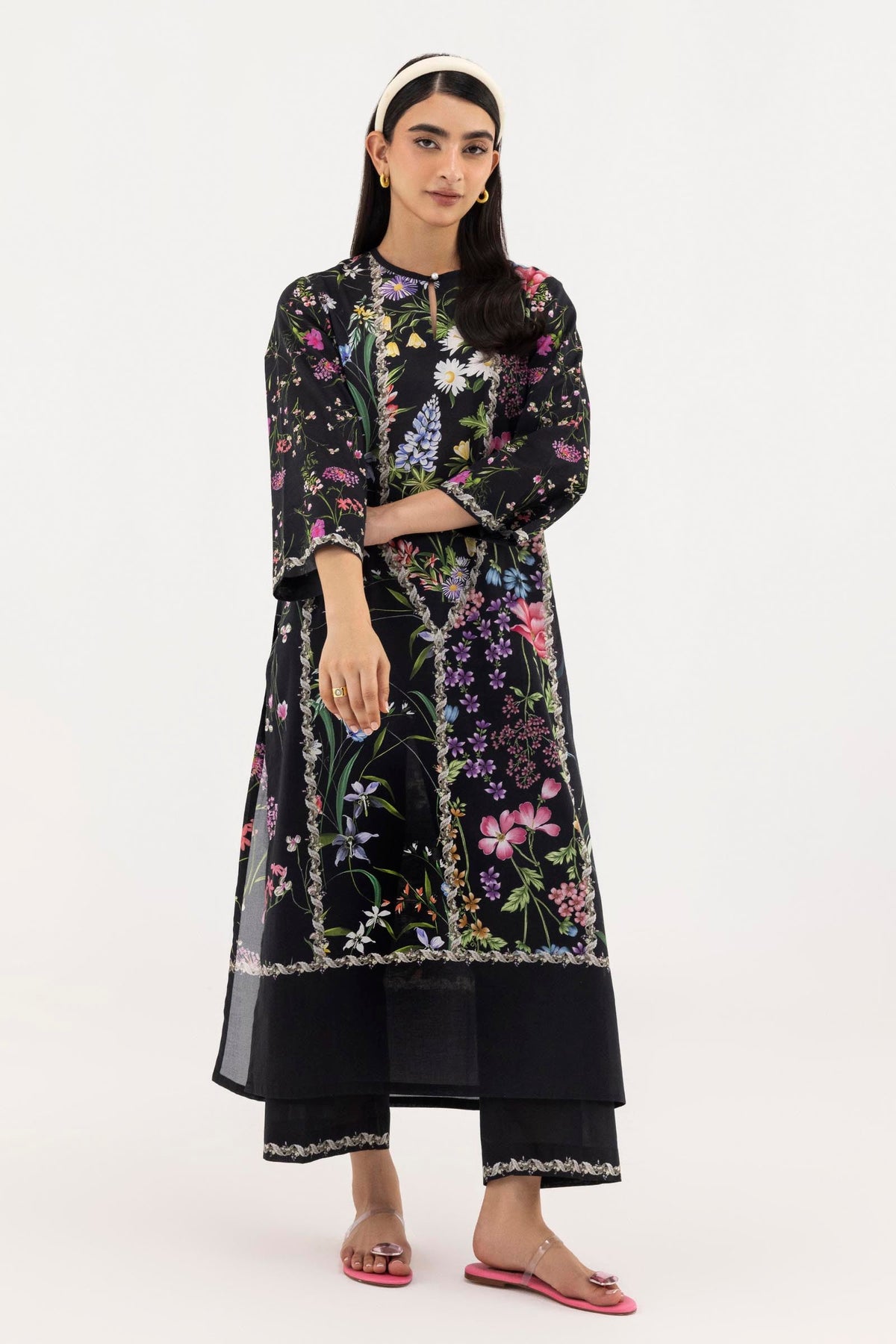Women's black floral shirt and cropped culotte set with decorative trim