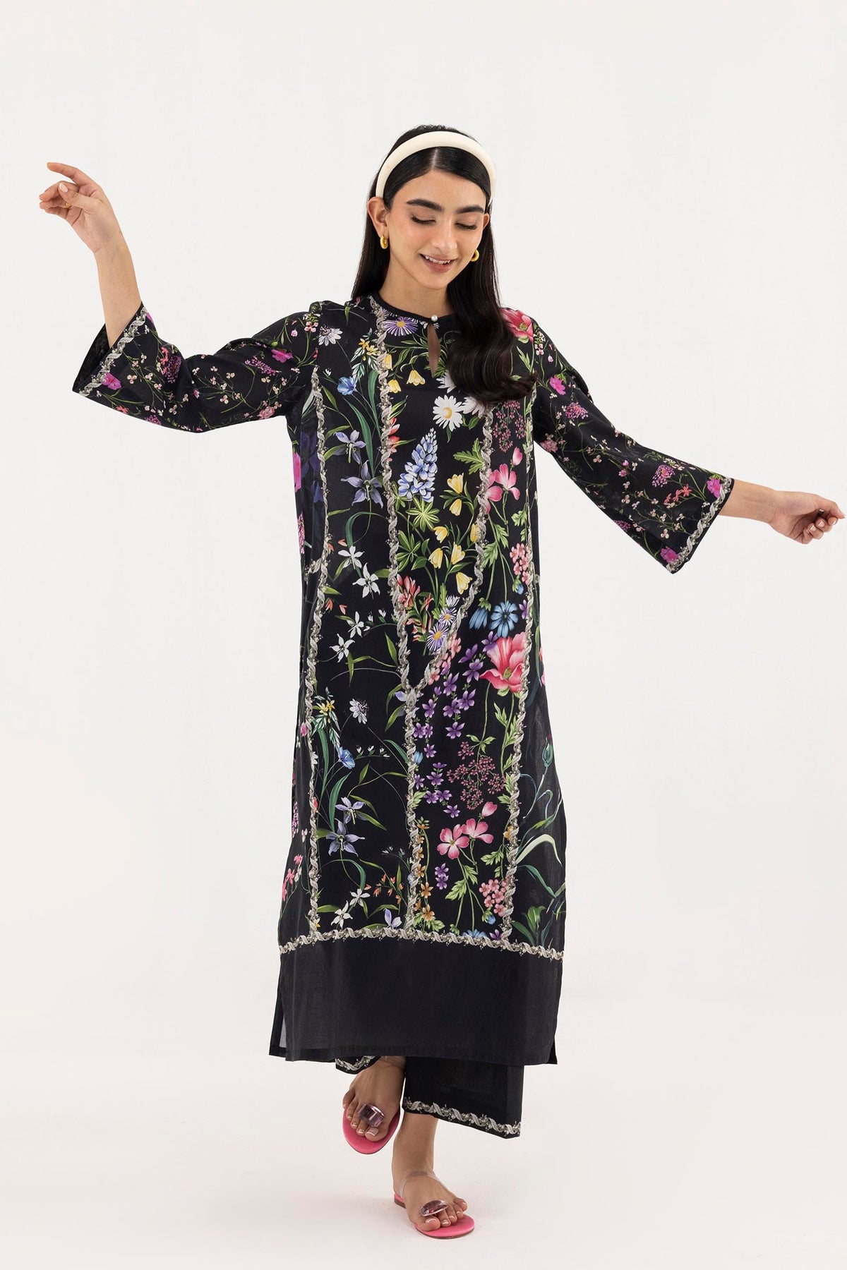 Women's black floral shirt and cropped culotte set with decorative trim