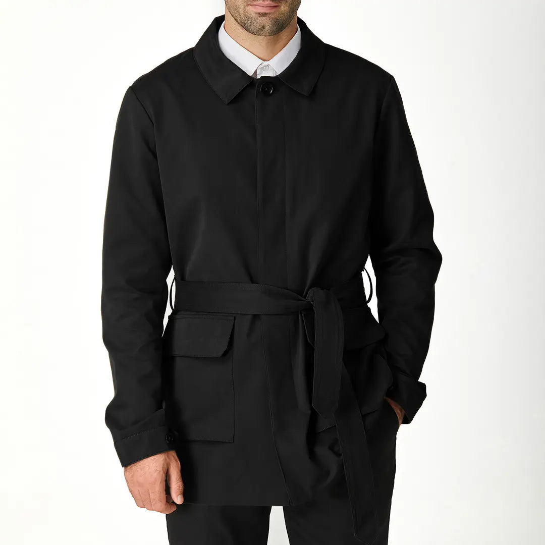 Black men's short trench coat with button front, long sleeves and rear storm flap