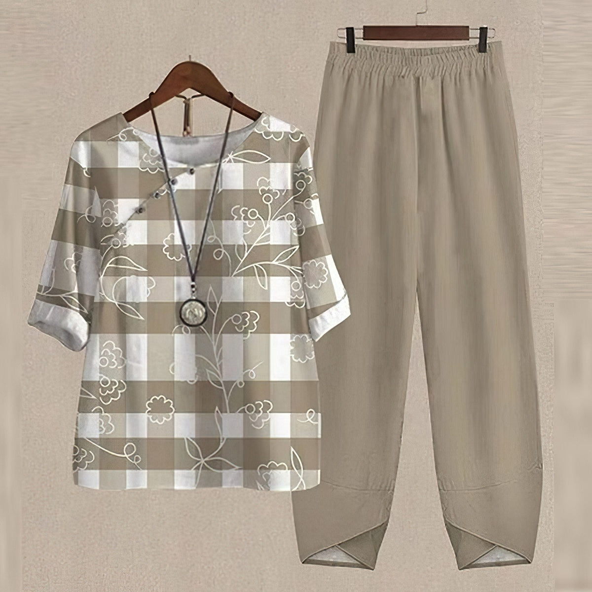 Women's two-piece set with short-sleeved patterned top and long trousers