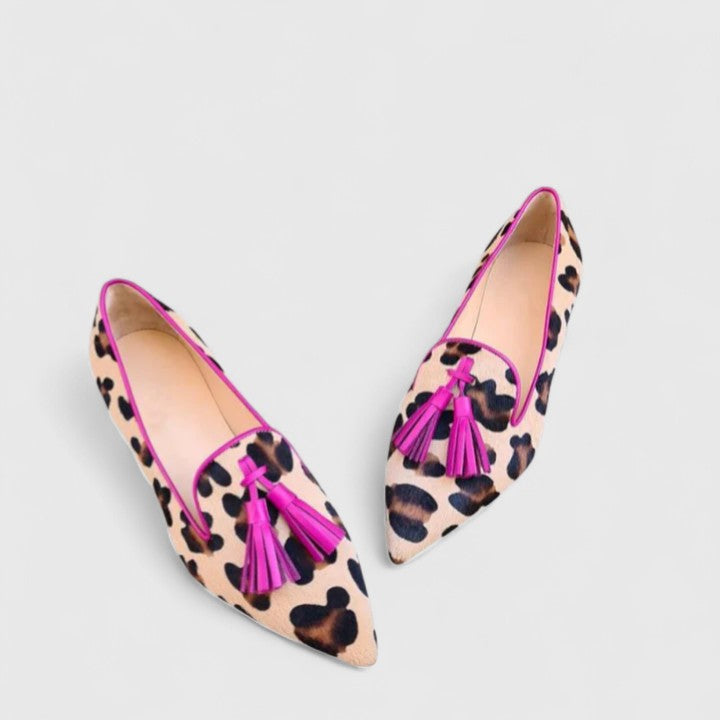 Women's pointed leopard print loafers with tassel trim