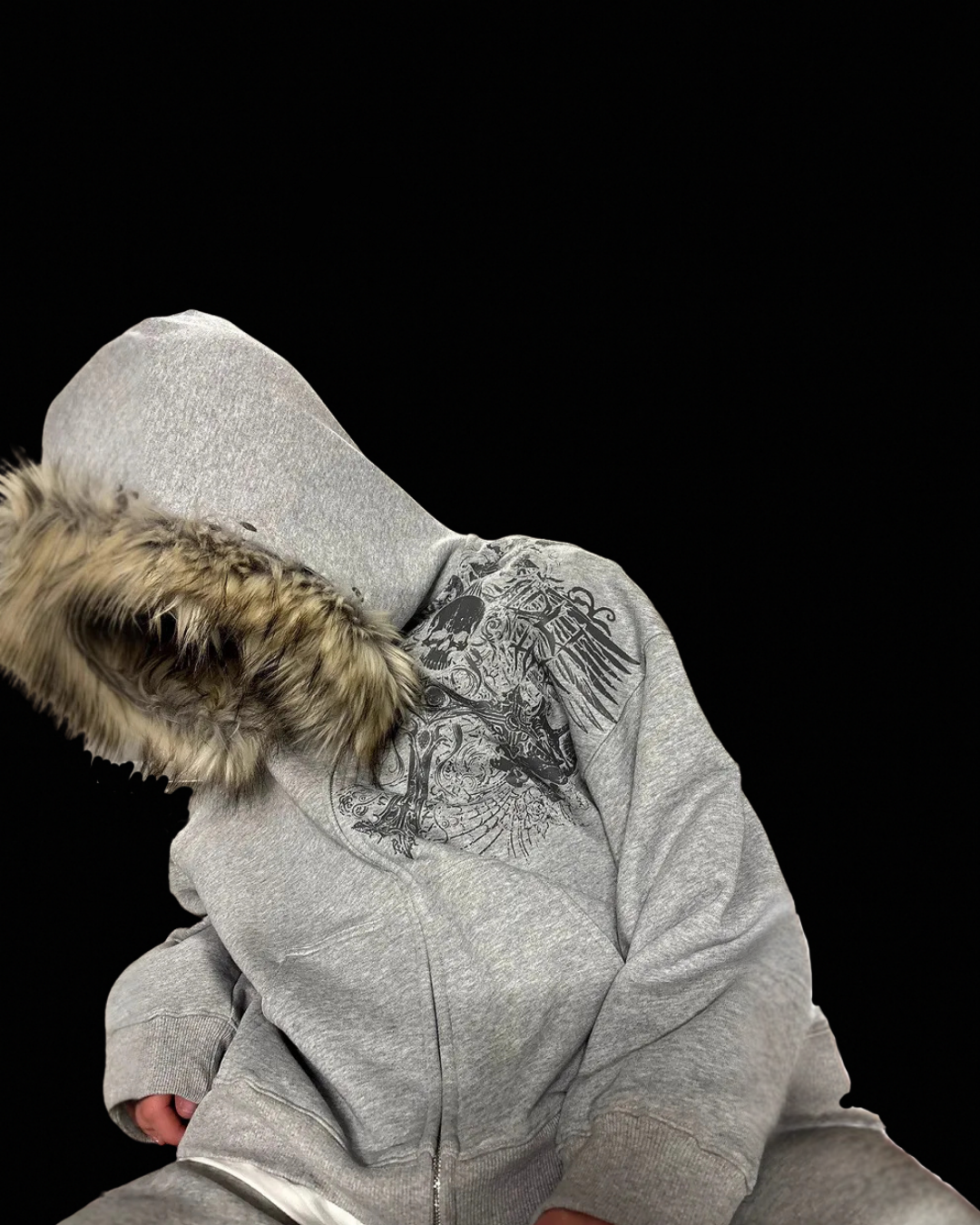 Hooded zip-up hoodie with fur-style trim and graphic front