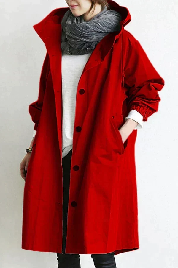 Women's longline hooded raincoat with button front and elasticated cuffs
