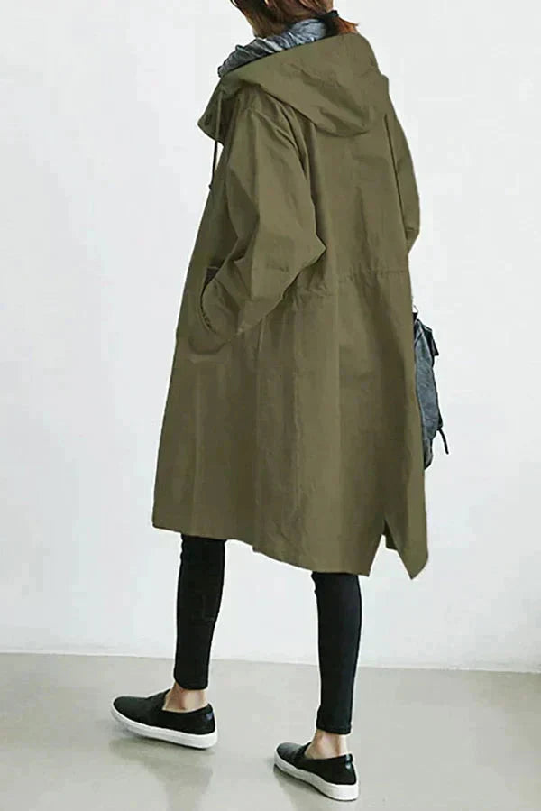 Women's longline hooded raincoat with button front and elasticated cuffs