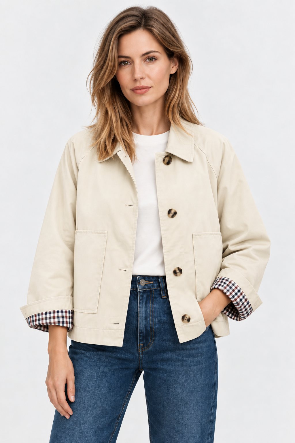 Women's short trench jacket with button front, patch pockets and checked cuff lining