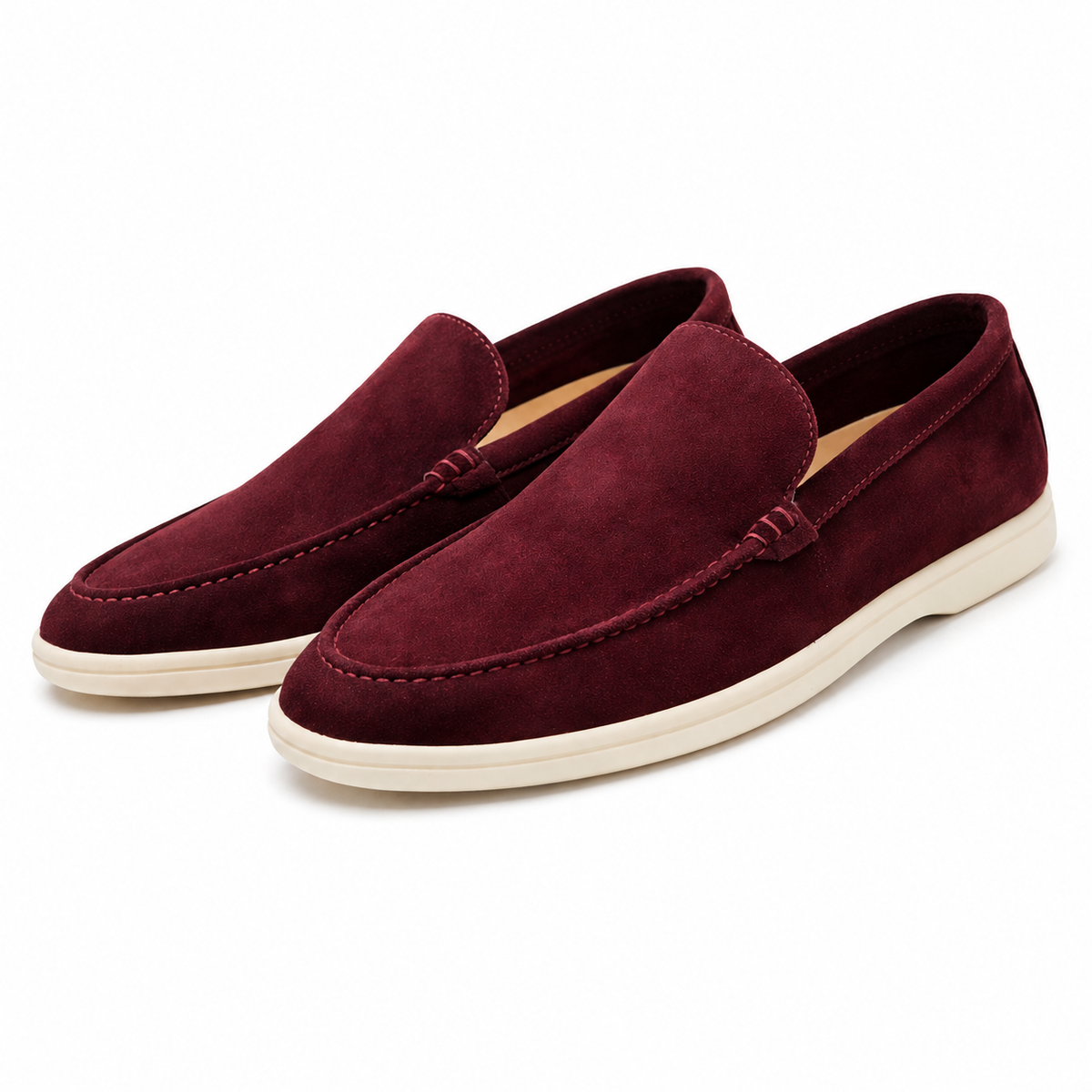 Men's moc toe slip-on loafers with stitched apron detail and low flat soles