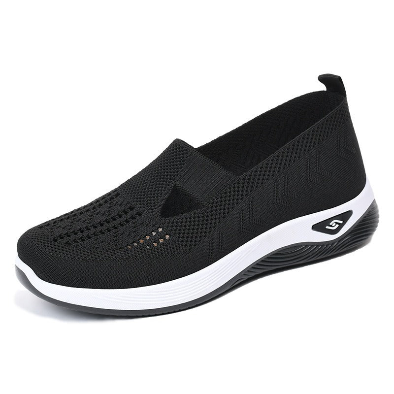 Women's slip-on knit-style trainers with a rounded toe and raised white sole