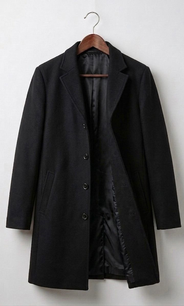 Women's long button front coat with notched lapels and angled pockets