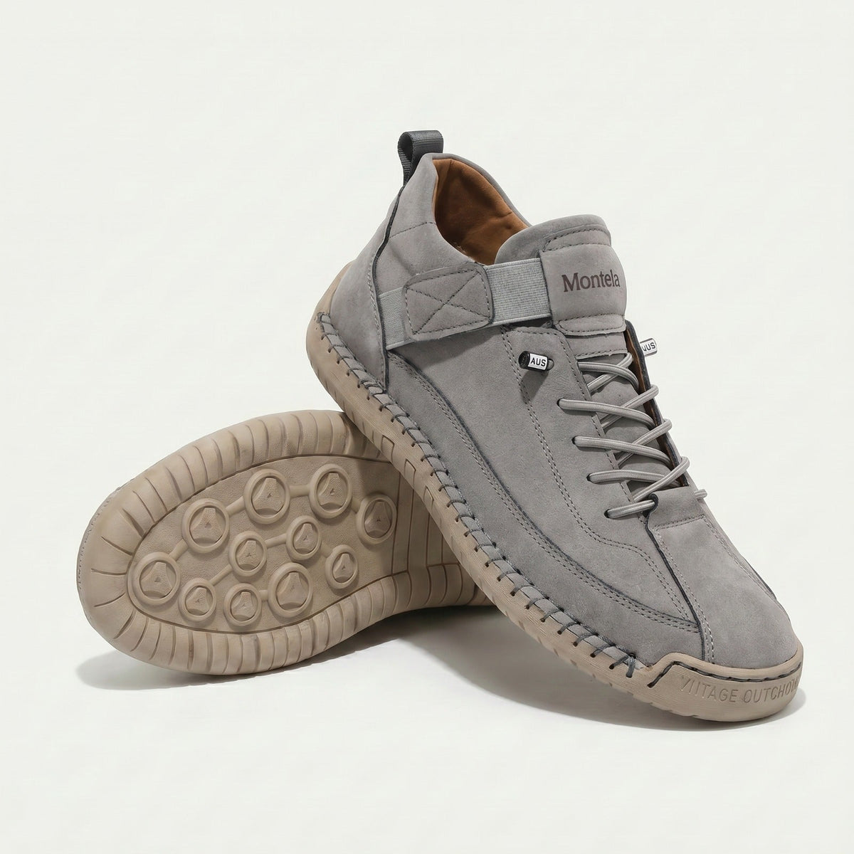 High-top lace-up sneakers with elastic ankle strap and textured flat sole
