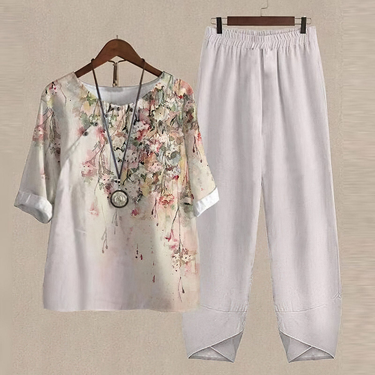 Women's two-piece set with short-sleeved patterned top and long trousers