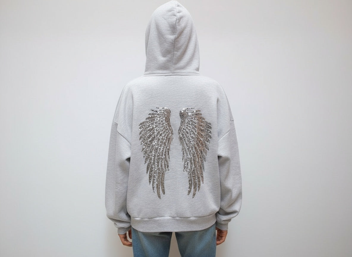 Women's grey hoodie with sequin wing detail on the back