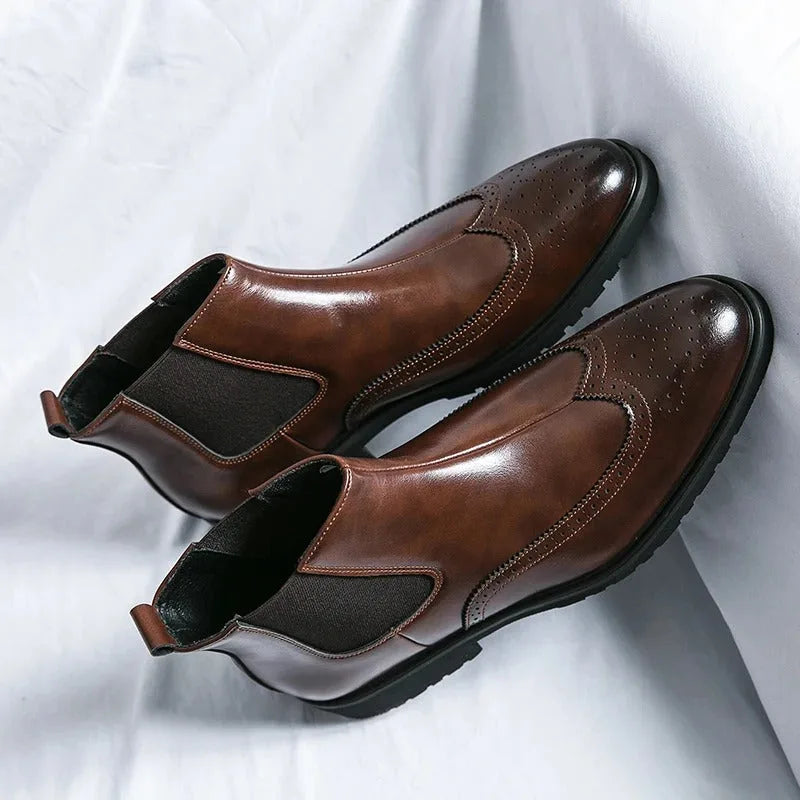 Chelsea boots with brogue detailing, elastic side panels and lug soles