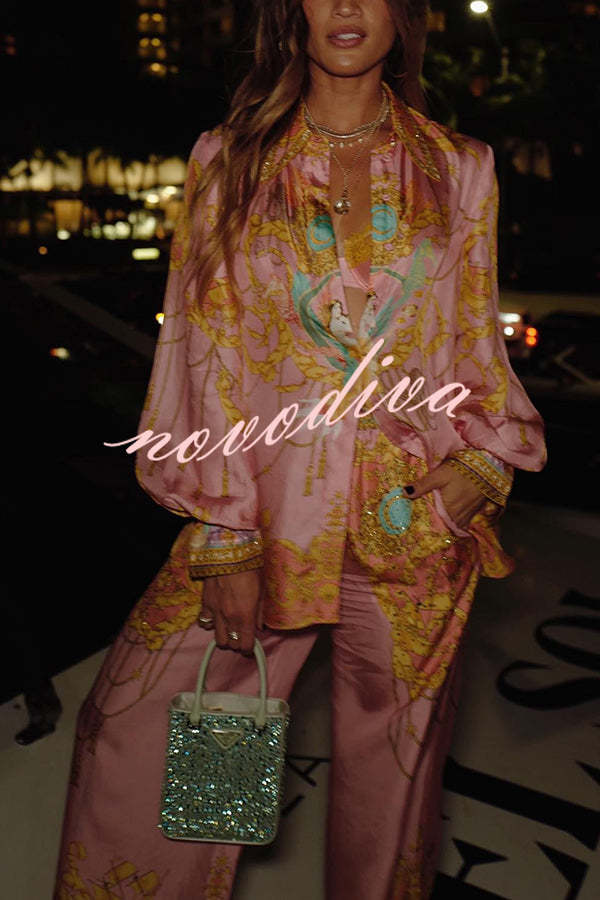 Woman wearing a pink abstract print shirt and wide-leg trousers set