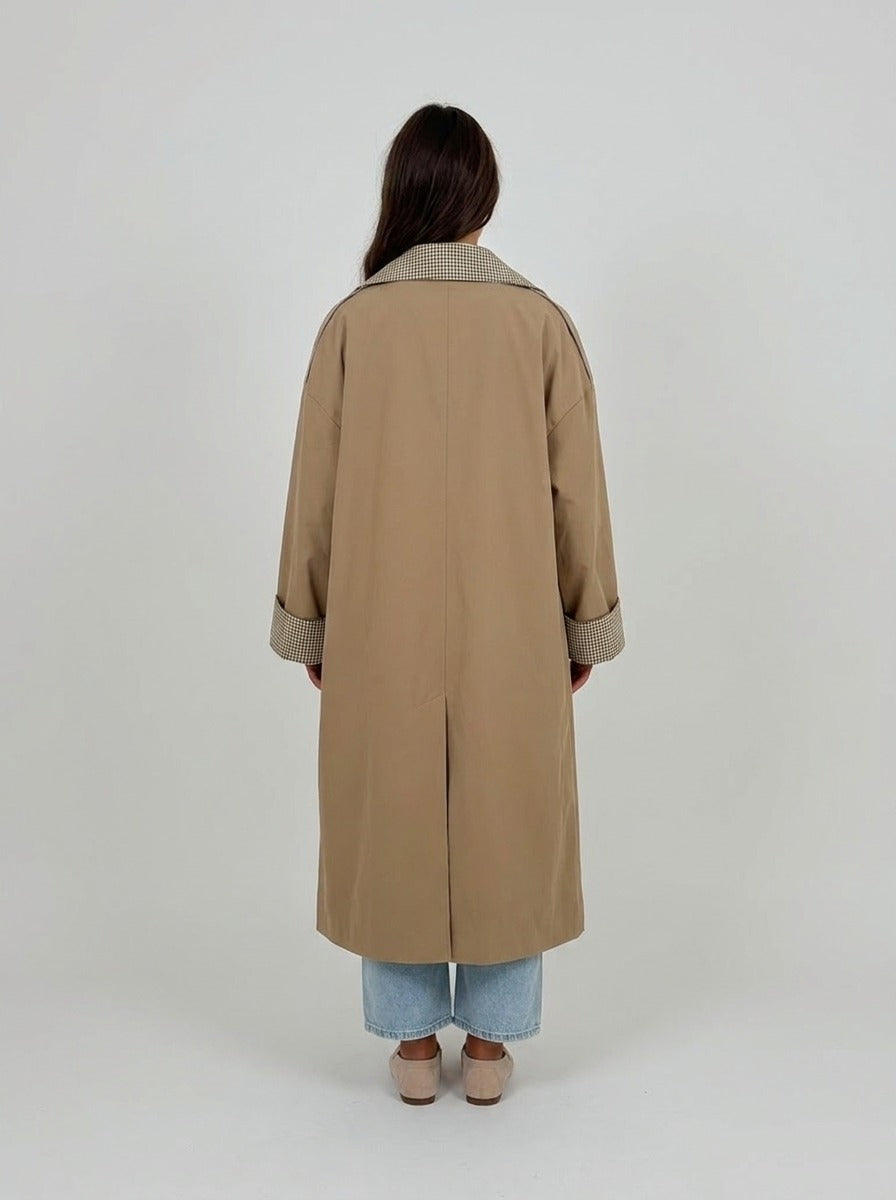 Women's beige trench coat with houndstooth lapels and turn-up cuffs