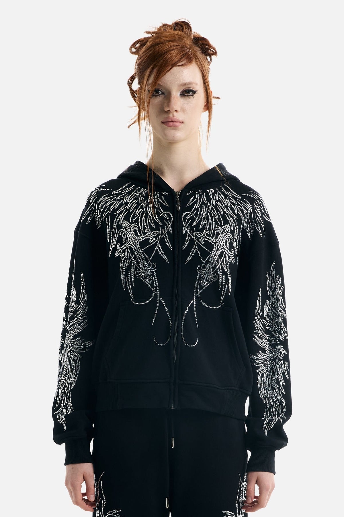 Black hoodie with silver rhinestone wing motifs, hood and zip front