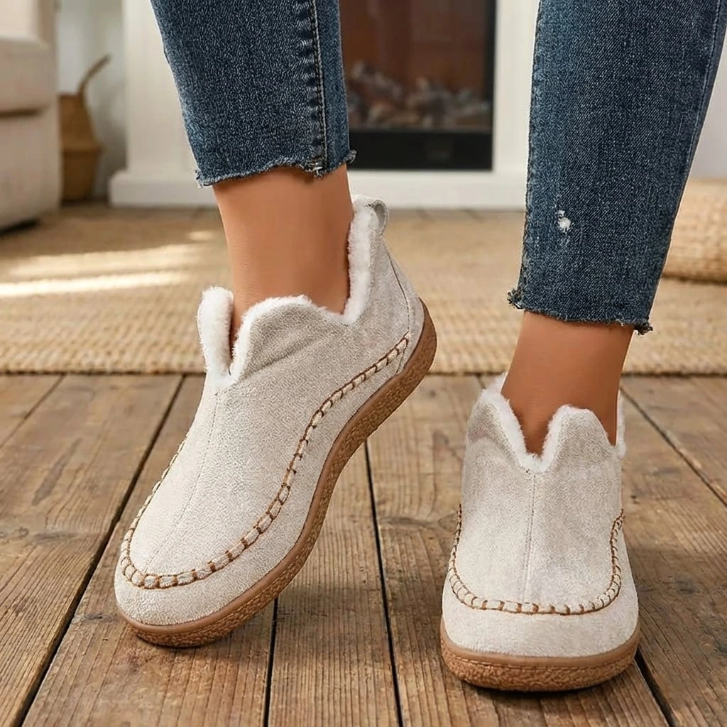 Women's fur-lined slip-on loafers with round toes and flat textured soles