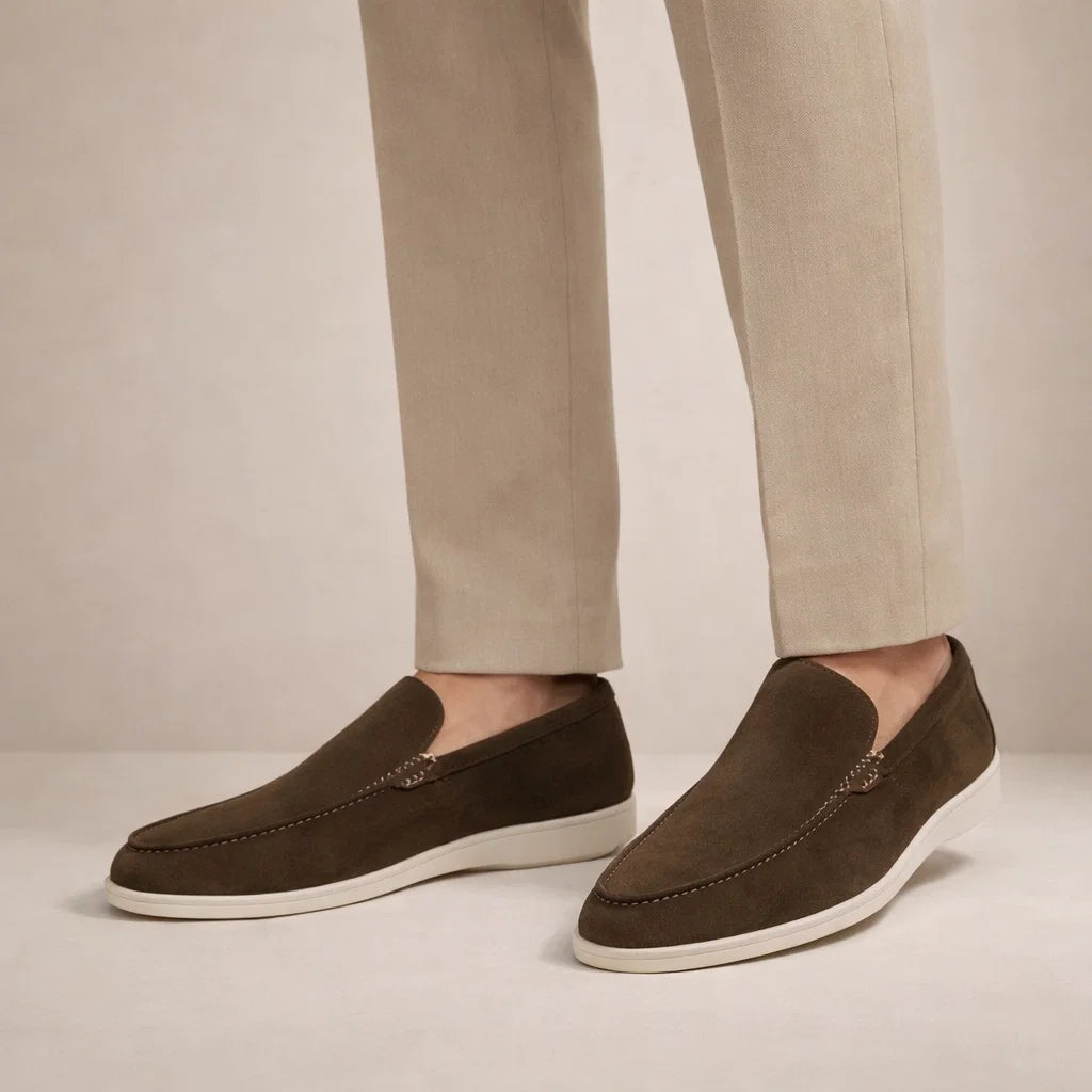 Men's slip-on moc toe loafers with stitched detail and flat light soles