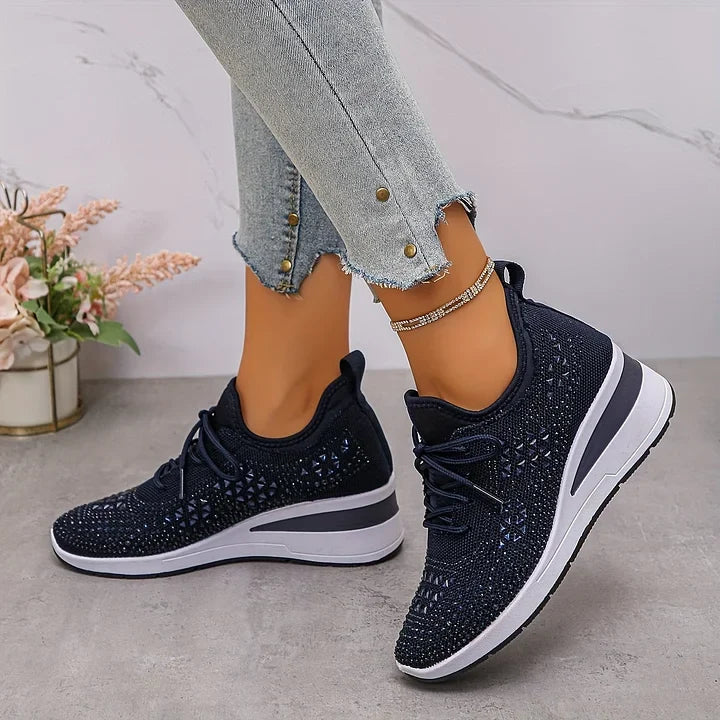 Women's lace-up mesh trainers with textured uppers and contrasting low-profile soles