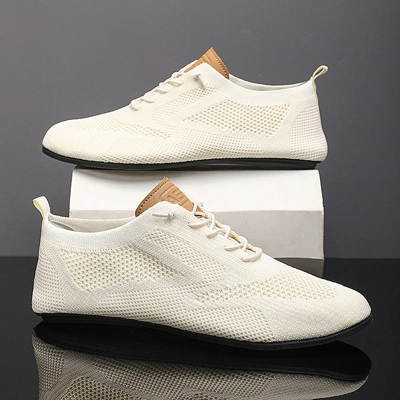Mesh knit lace-up trainers with textured panels, round toes and flat soles