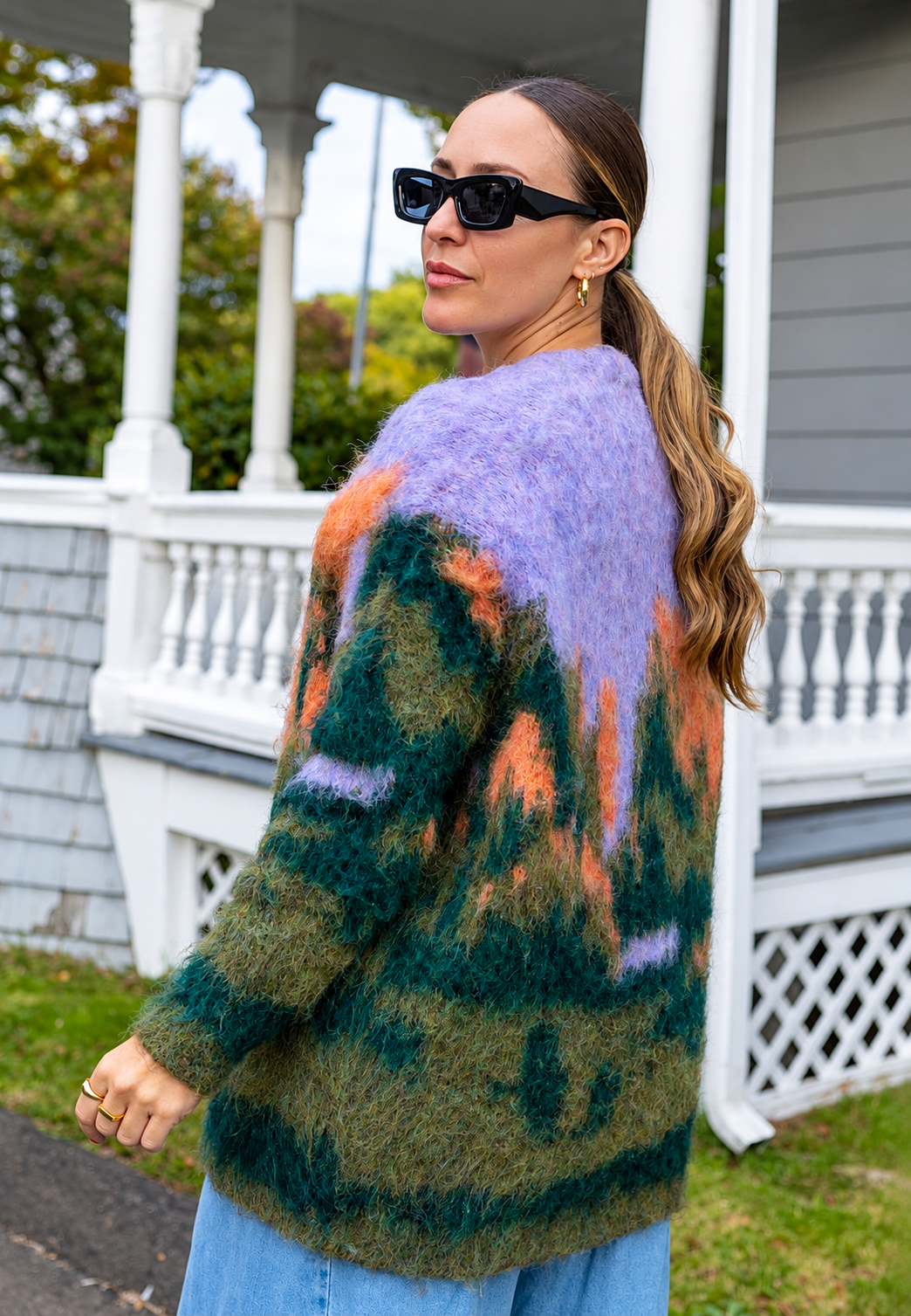 Women's long green abstract pattern cardigan with V-neck and button front