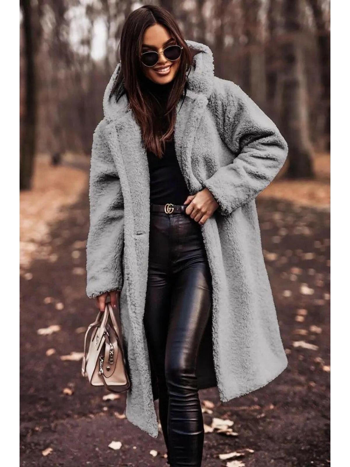 Women's longline hooded teddy coat with long sleeves and front pockets