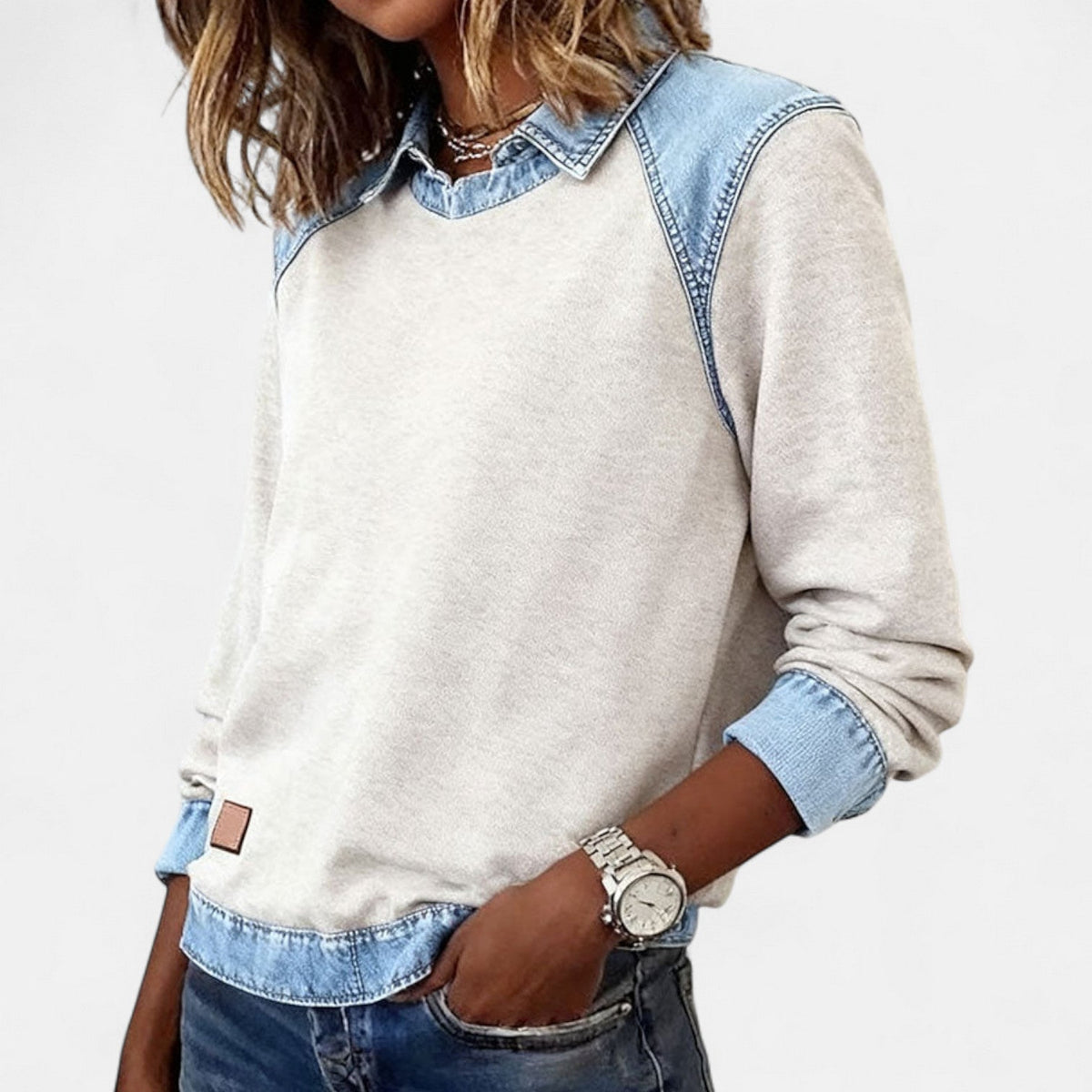 Women's long-sleeved collared sweatshirt with contrasting denim-style patchwork panels