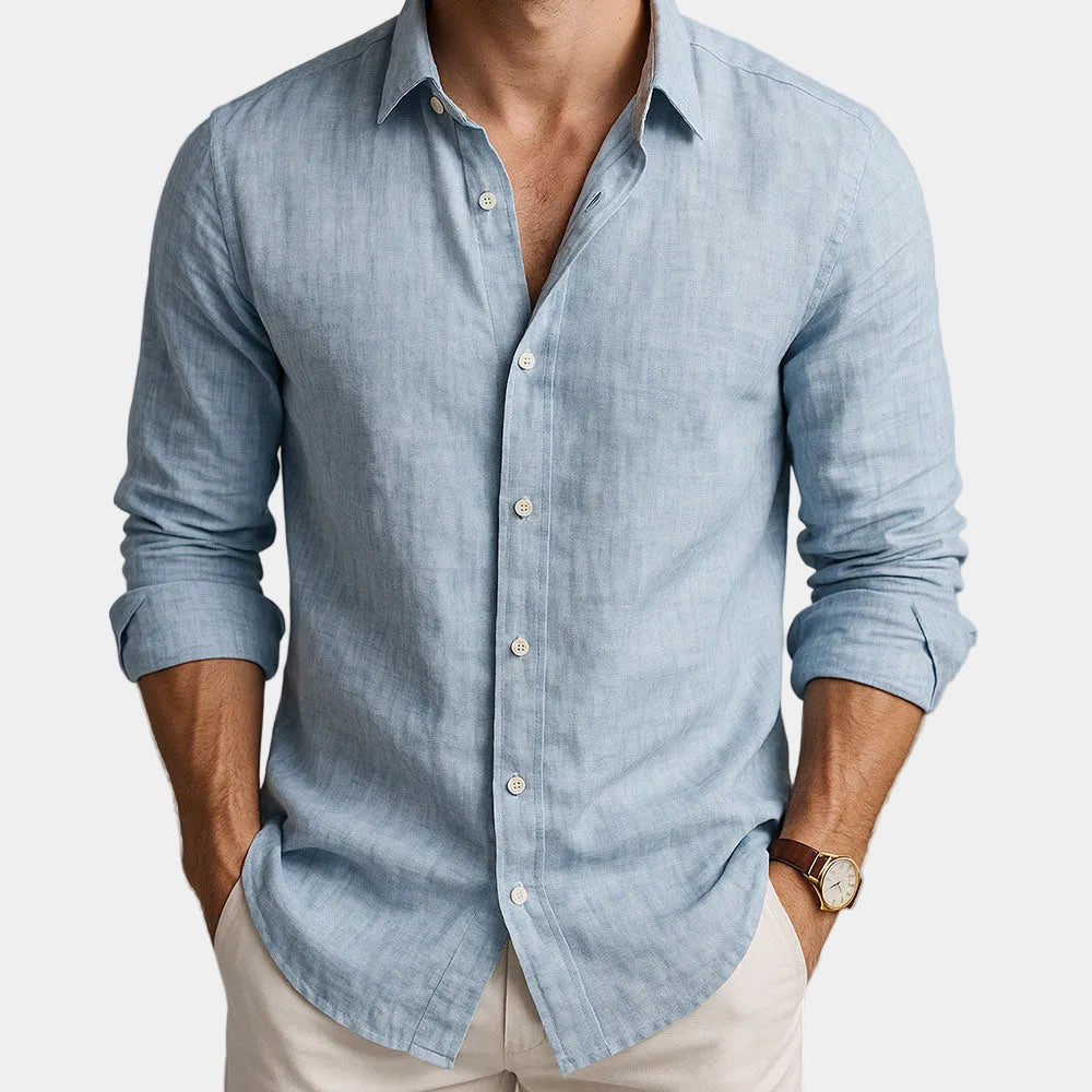 Men's long-sleeve button-up shirt with pointed collar and curved hem