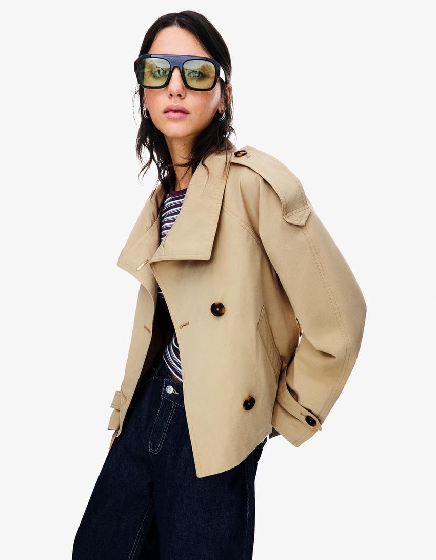 Women's cropped trench jacket with high collar, button front and belted waist