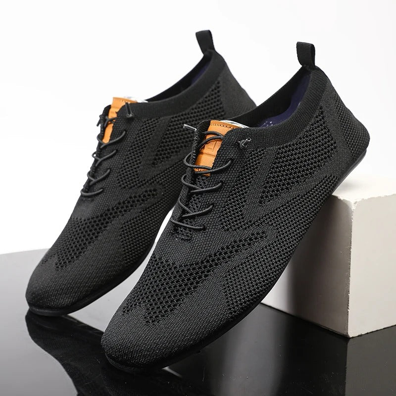 Mesh knit lace-up trainers with textured panels, round toes and flat soles