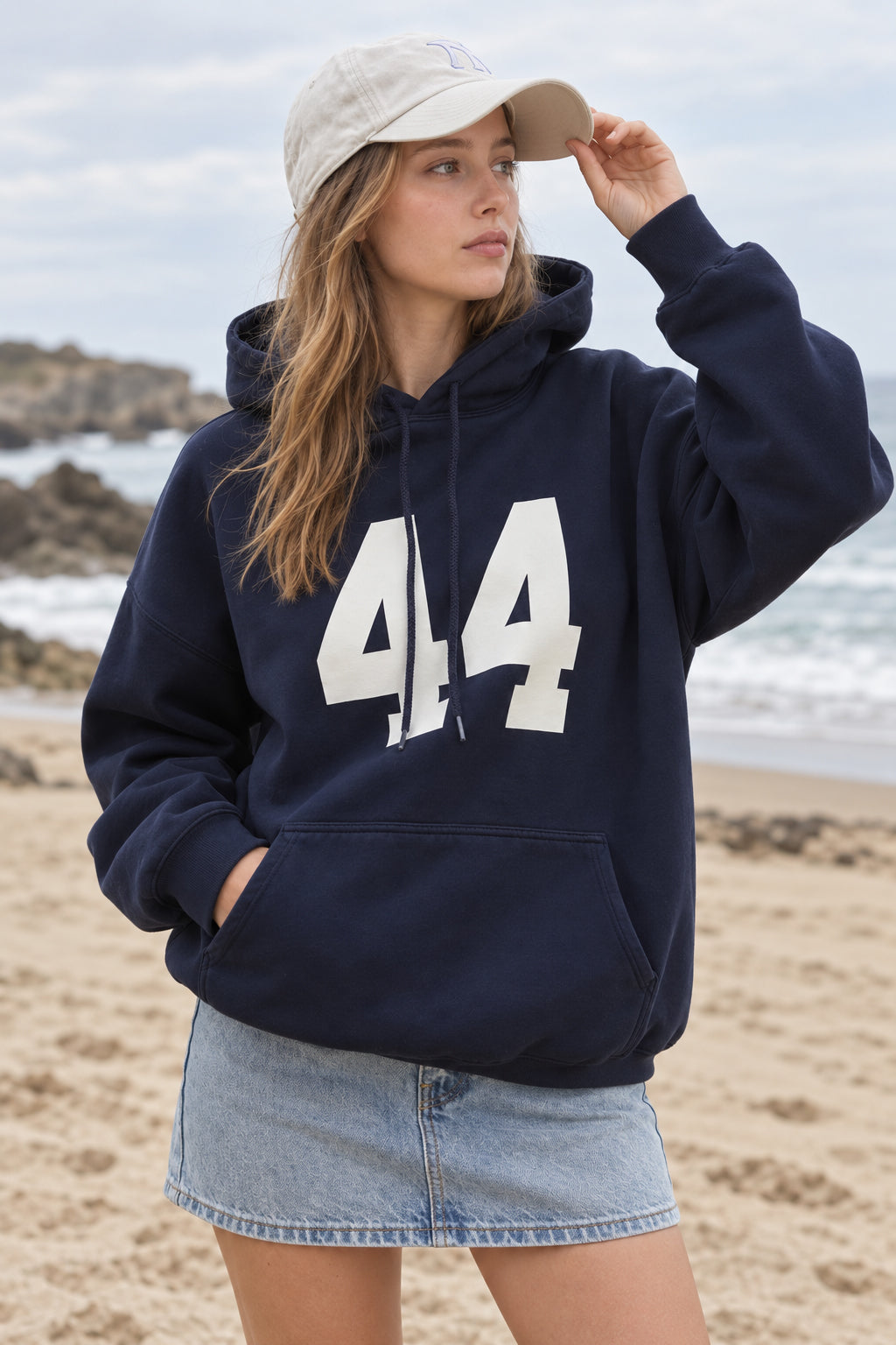 Women's oversized hoodie with hood, front kangaroo pocket and bold number graphic