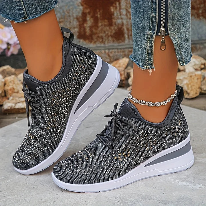Women's lace-up mesh trainers with textured uppers and contrasting low-profile soles