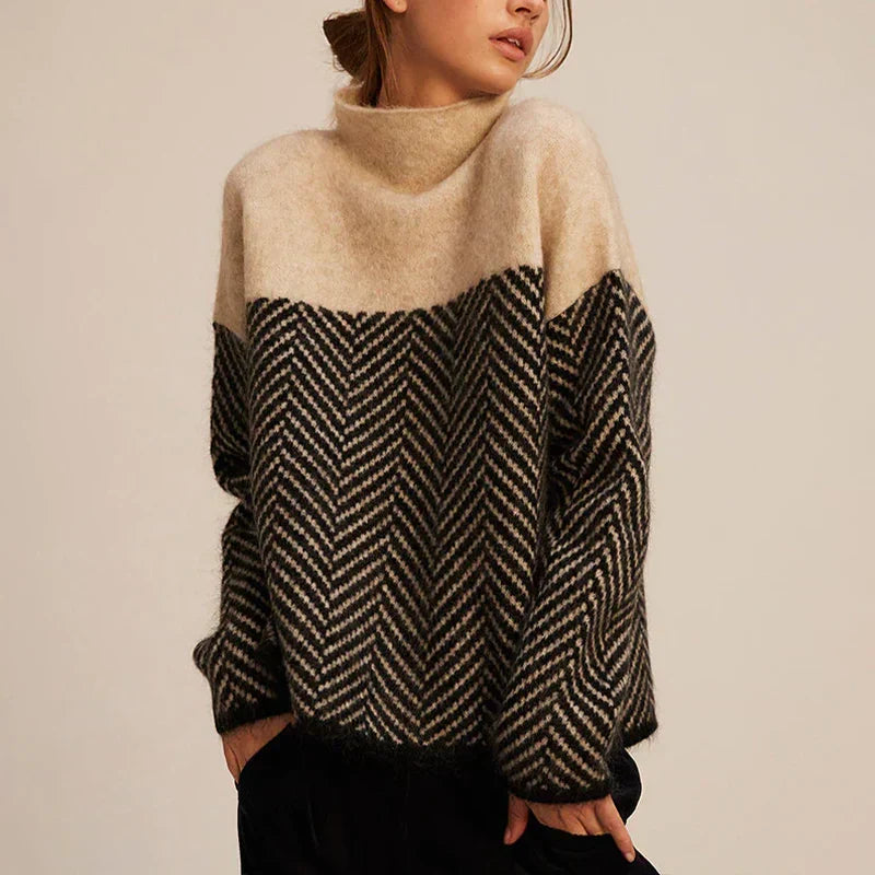Women's funnel neck jumper with contrasting chevron pattern and long sleeves