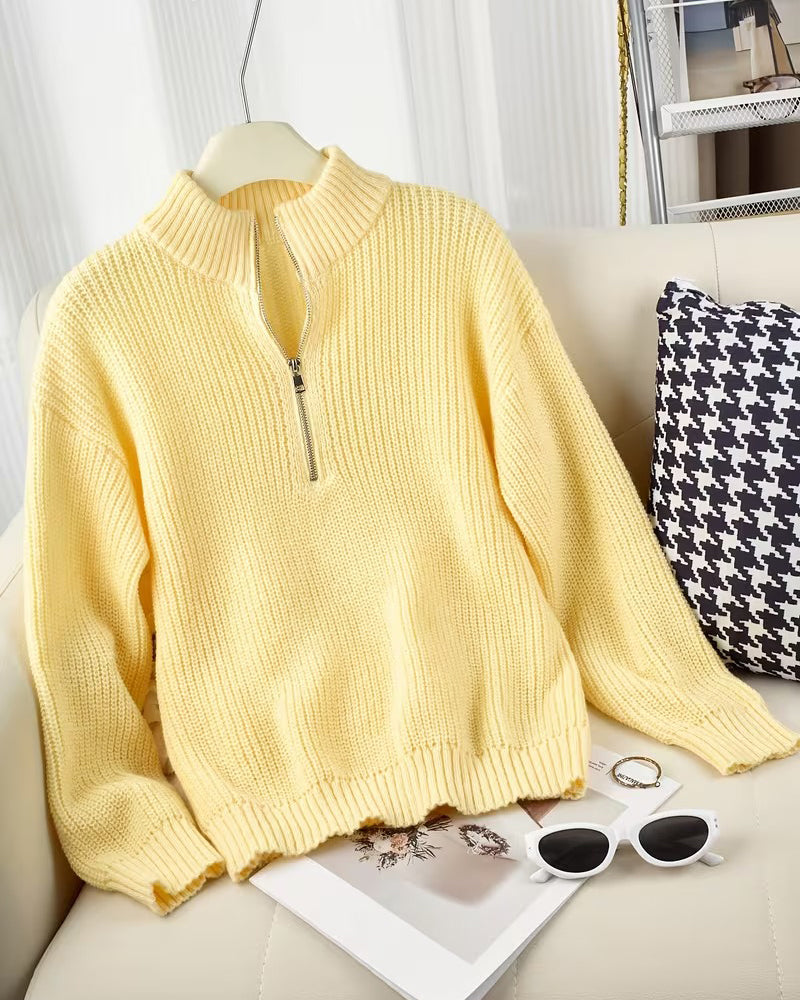 Women's yellow ribbed half-zip jumper with a funnel neck and long sleeves