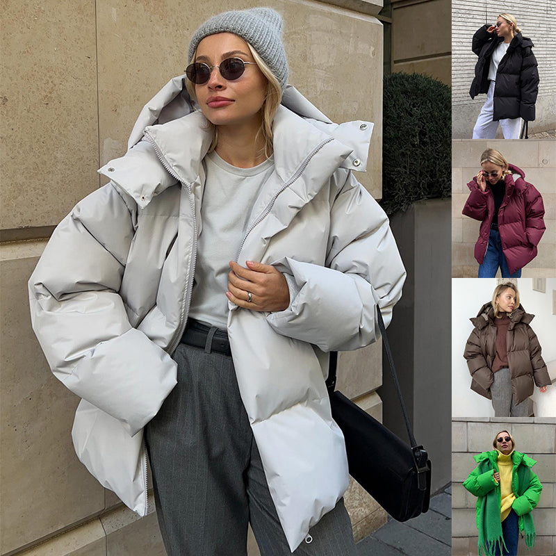 Women's hooded padded parka jacket with long sleeves and zip fastening