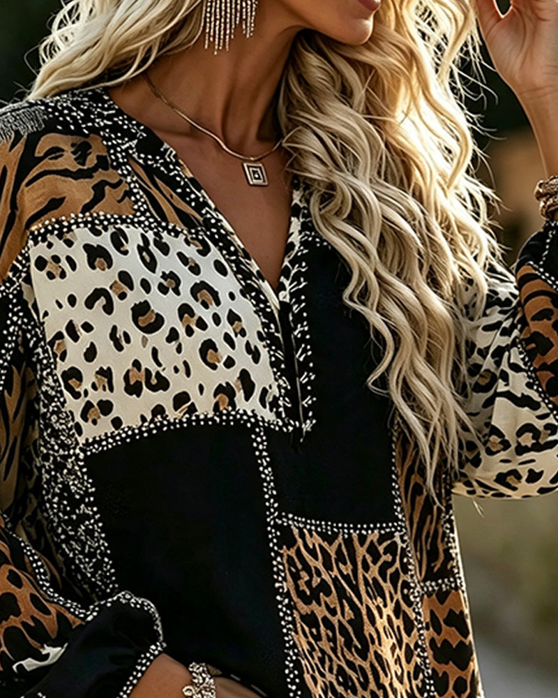 Women's long-sleeve patchwork blouse with mixed animal print panels