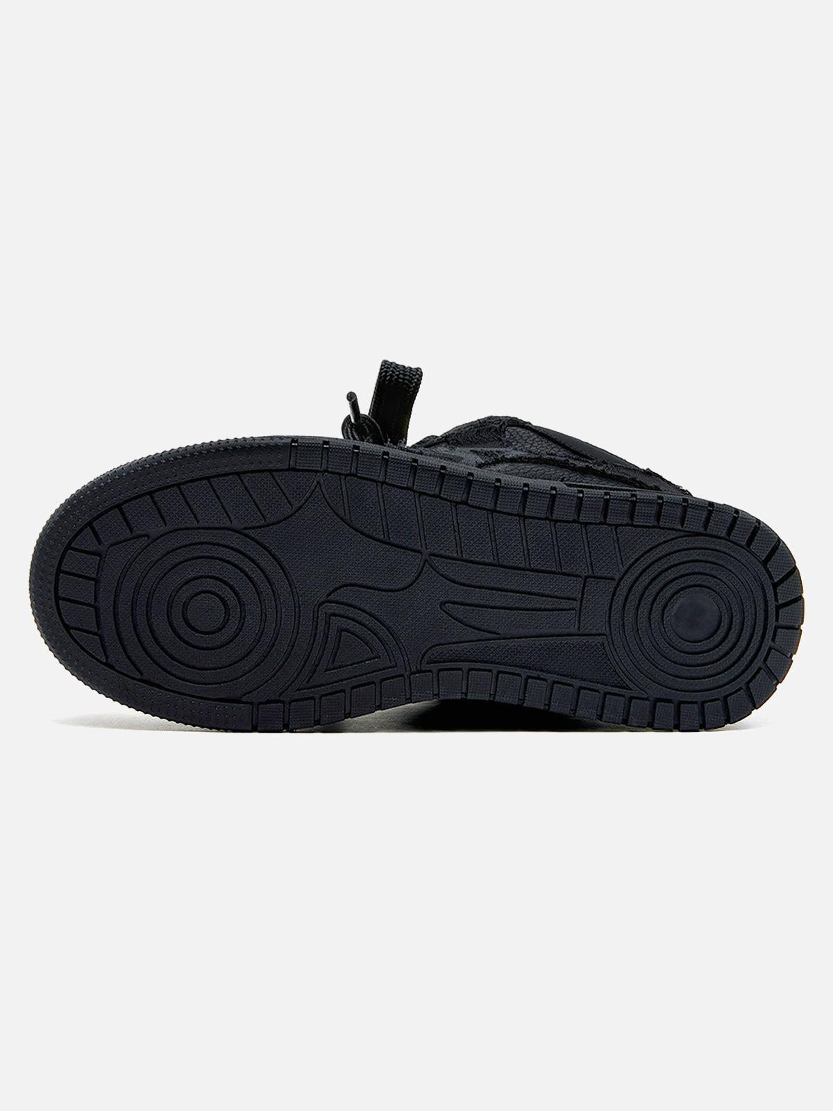 Black high-top skate trainers with lace-up fronts and camouflage side detailing