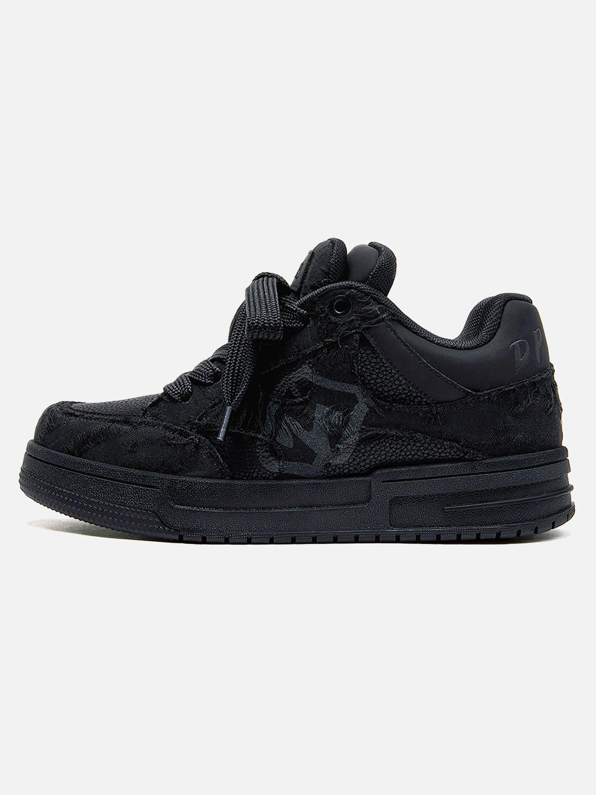 Black high-top skate trainers with lace-up fronts and camouflage side detailing