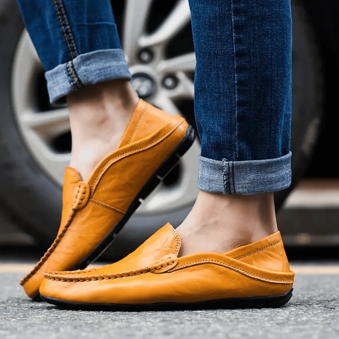 Men's slip-on loafer with stitched moc toe and decorative vamp trim