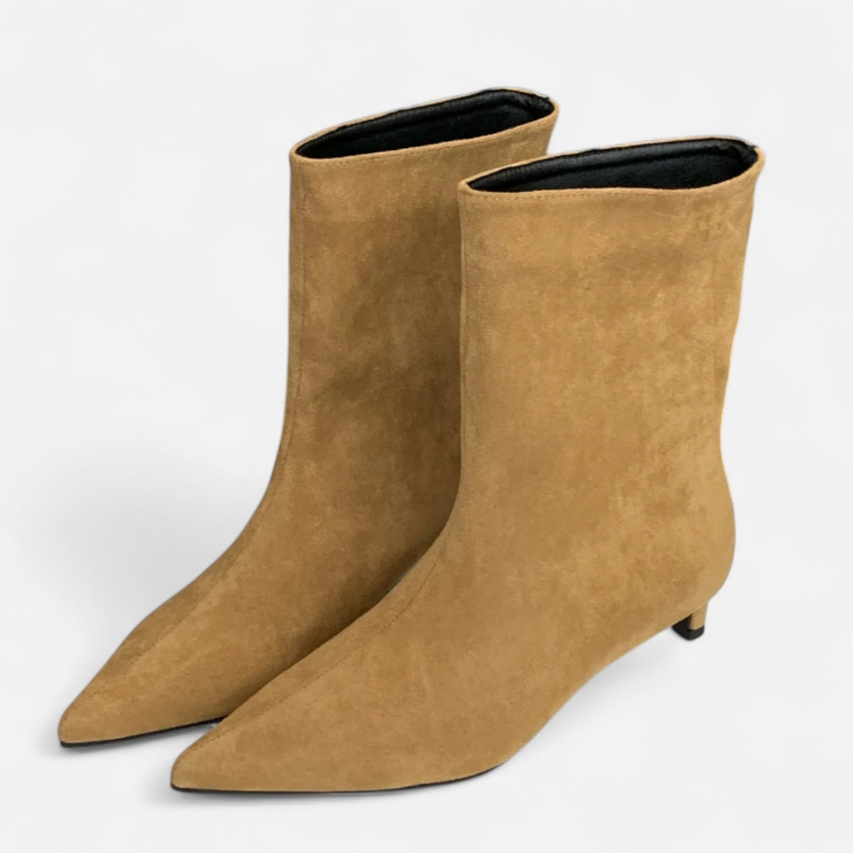 Women's pointed-toe ankle boots with low heels and pull-on shafts