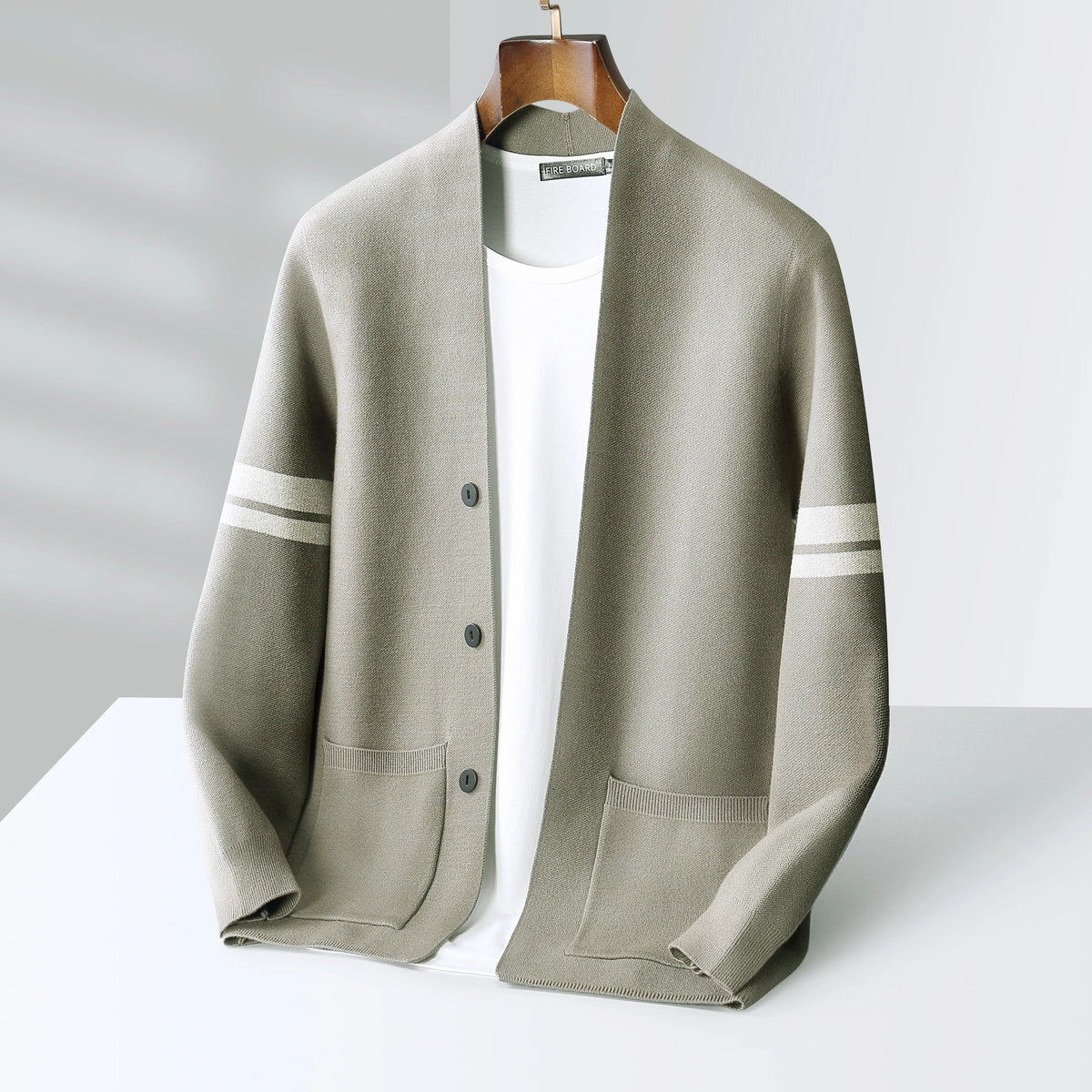 Men's long-sleeved striped cardigan with button fastening and front patch pockets