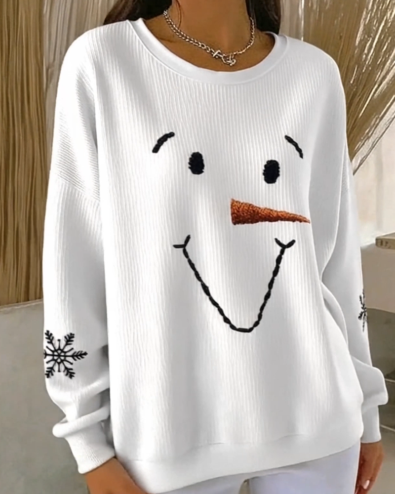 Women's white sweatshirt with a snowman face graphic and snowflake sleeve details